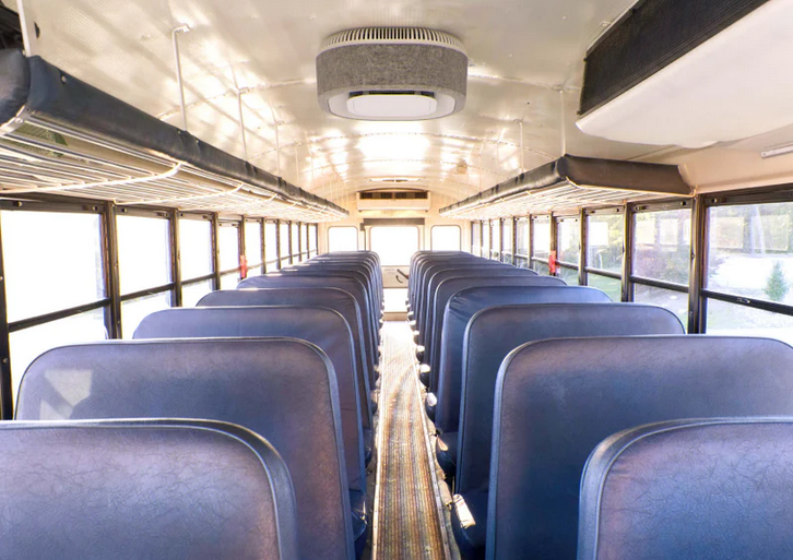 aura air purifier on a yello school bus reach esg supplier diversity goals